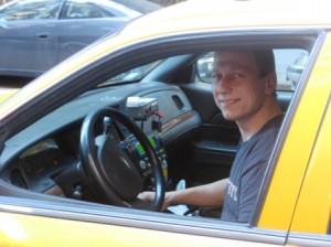 Huseyin Kamal in the driver's seat.
