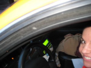 Cab #100, my ridiculous purse, and me (Wish I could say this was taken by a drunken passenger)