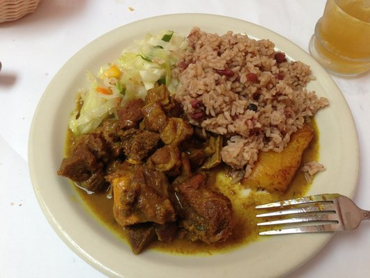 Curried goat at The Door. Photo by Yvel G. on Yelp.